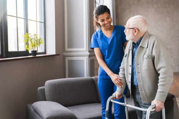 Home Health Nurse Helping Patient