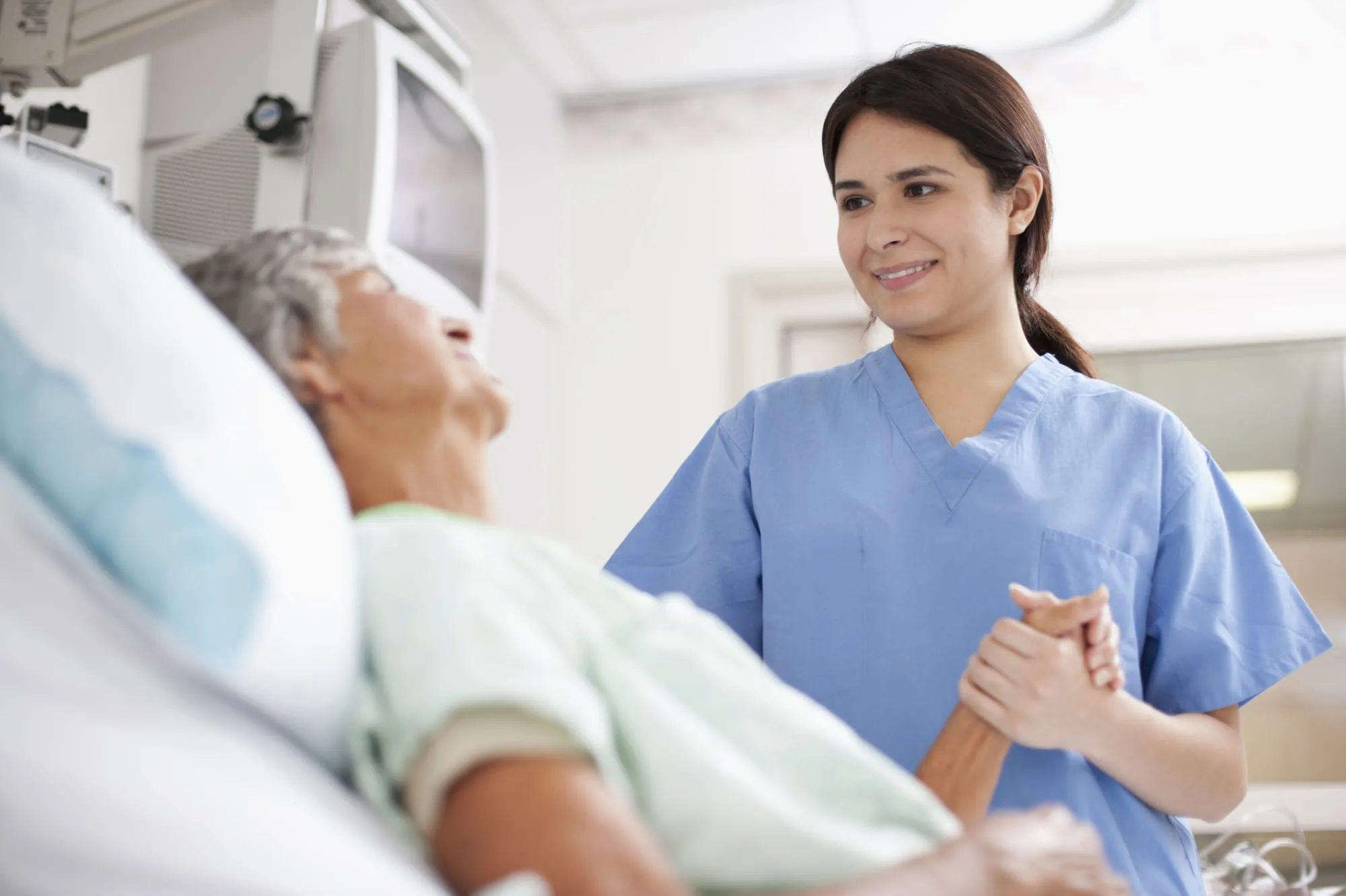 Medical Surgical Nurse Helping Patient